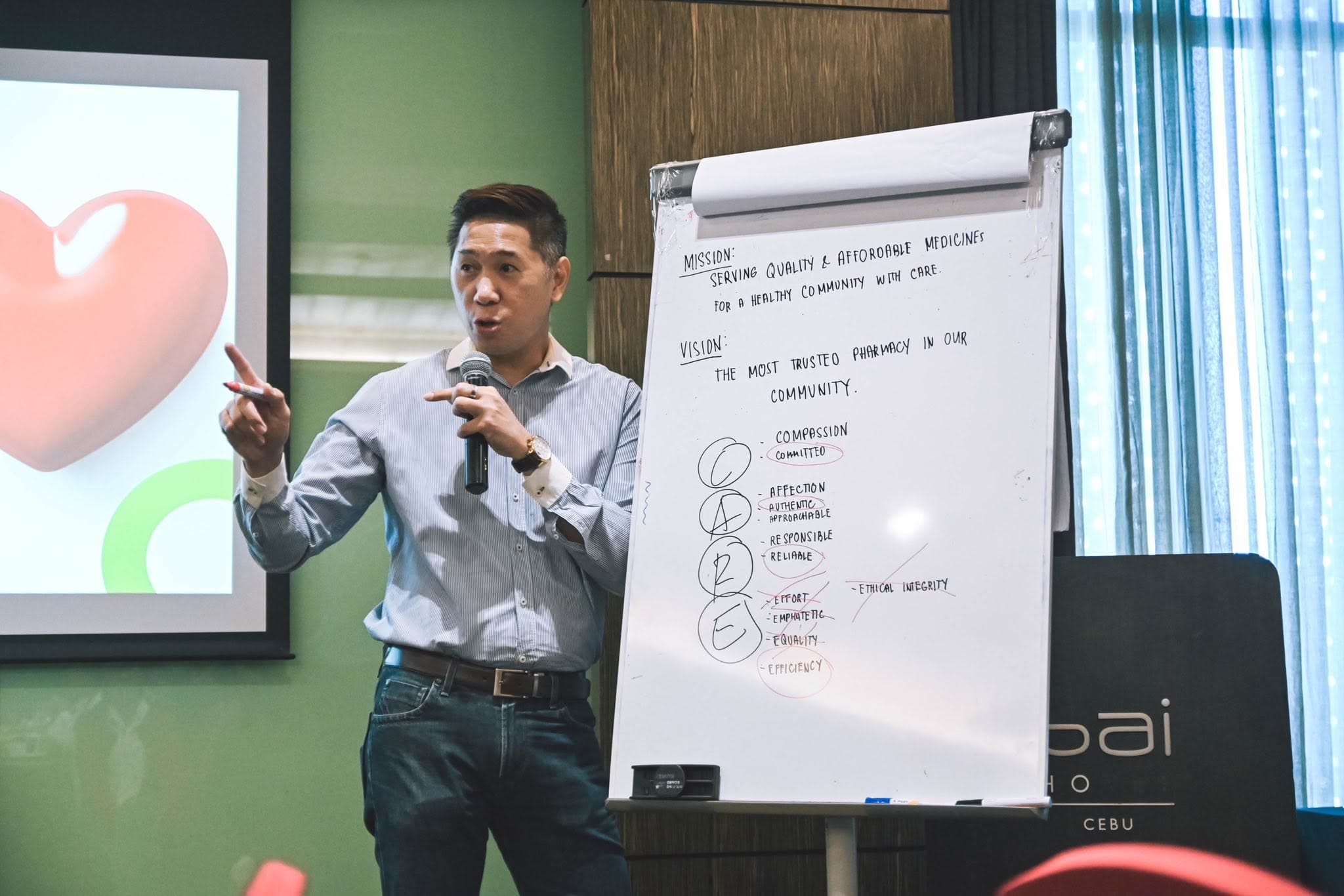 A participant presenting to the room during a breakout exercise